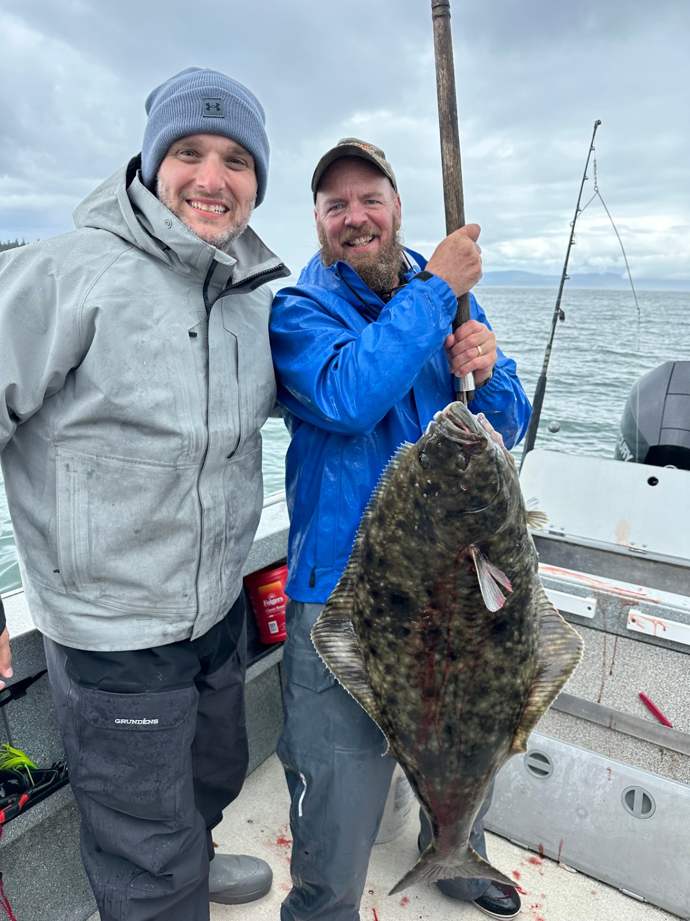 Guide and guest with a Pacific halibut